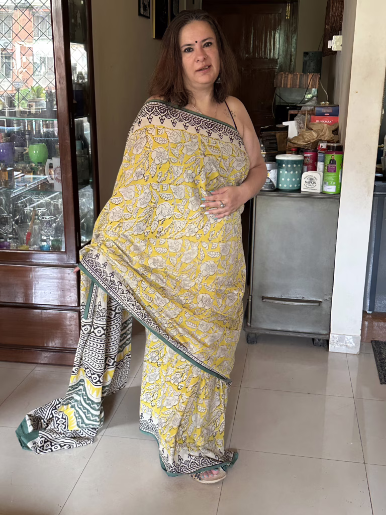 Hand-block printed mustard Mulmul saree from Binks